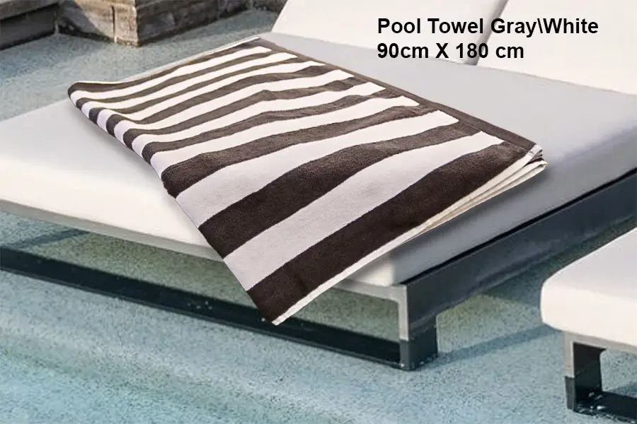 High-quality 100% cotton pool towel from Albaghlisponge – soft and absorbent, perfect for beach or poolside use.
